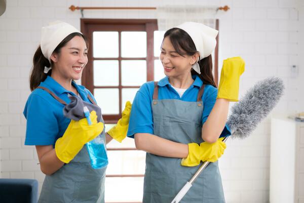 portrait-of-asian-female-cleaning-service-staff-in-uniform-and-rubber-gloves-housework-concept-photo
